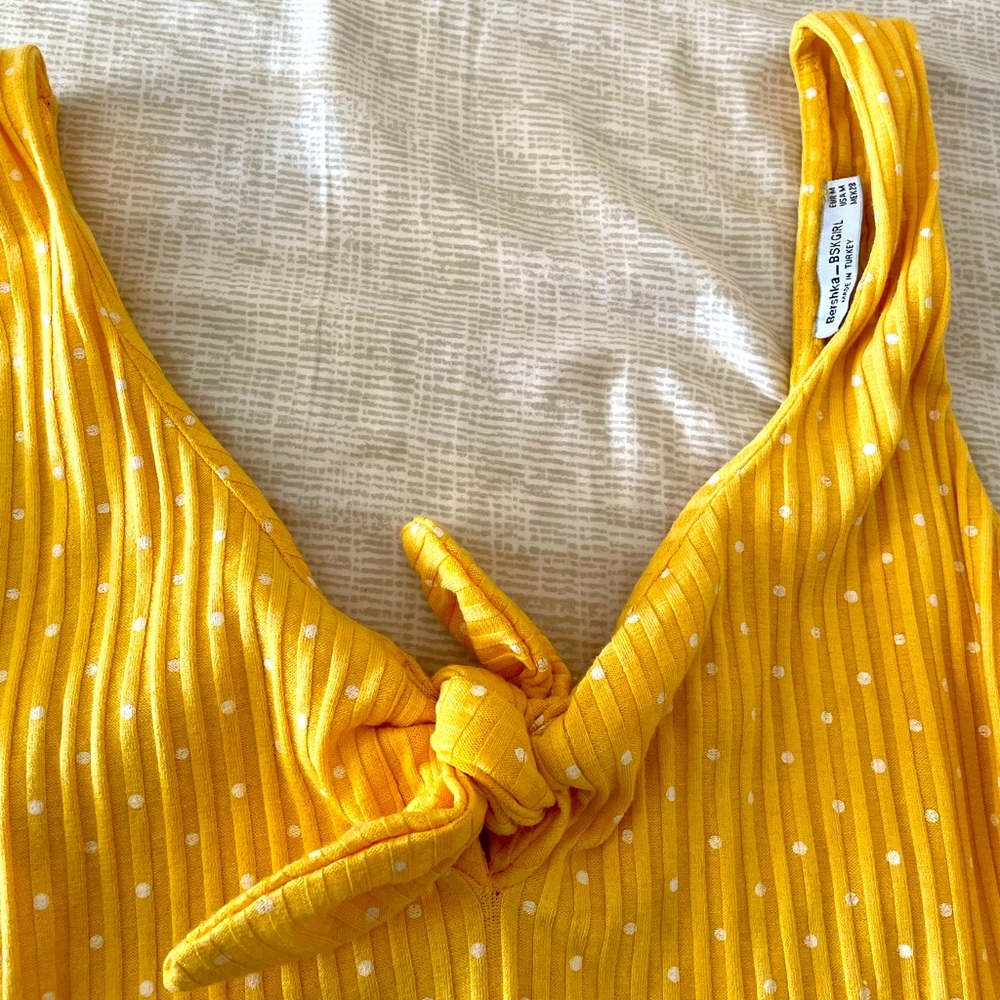 Yellow bodysuit
